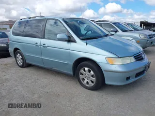 2004 Honda Odyssey EX-L z VIN 5FNRL18964B044809, wystawiony jako IAAI lot #42250480 z przebiegiem 260 507 mil mil oraz . Historia ofert i sprzedaży dostępna na DreamBid. Obrazek 1.