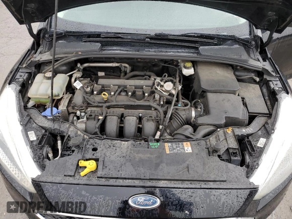 2017 Ford Focus SE with VIN 1FADP3F2XHL316724, listed as a Copart auction lot 52321155 with 137,005 mi miles and Salvage Title. Bid and sale history available at DreamBid. Image 11.