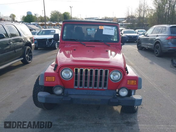 2003 Jeep Wrangler Sport with VIN 1J4FA49S13P320159, listed as a IAAI auction lot 41935699 with 212,355 mi miles. Bid and sale history available at carsss.com. Image 12.
