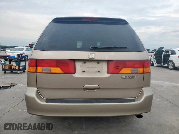 2004 Honda Odyssey EX-L with VIN 5FNRL18944B107051, listed as a Copart auction lot 58542335 with 207,951 mi miles and Salvage title. Bid and sale history available at DreamBid. Image 6.