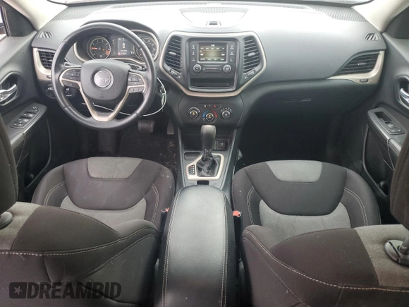 2015 Jeep Cherokee Sport z VIN 1C4PJLAB5FW677015, wystawiony jako Copart lot #58986705 z przebiegiem 112 446 mil mil oraz Szkoda całkowita • Salvage title. Historia ofert i sprzedaży dostępna na DreamBid. Obrazek 8.