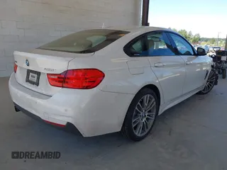 2015 BMW 4 Series 428i xDrive z VIN WBA4A7C55FD413965, wystawiony jako IAAI lot #42368615 z przebiegiem 108 308 mil mil oraz . Historia ofert i sprzedaży dostępna na DreamBid. Obrazek 4.