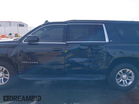 2018 Chevrolet Suburban LT with VIN 1GNSCHKC3JR237396, listed as a IAAI auction lot 41774171 with 205,970 mi miles and . Bid and sale history available at DreamBid. Image 14.