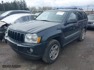 2005 Jeep Grand Cherokee Laredo with VIN 1J4HS48N45C524871, listed as a IAAI auction lot 41920807 with 169,633 mi miles. Bid and sale history available at carsss.com. Image 2.