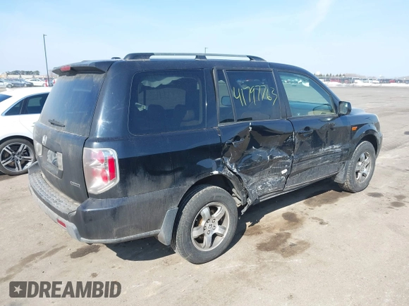 2006 Honda Pilot EX-L with VIN 5FNYF18766B008879, listed as a IAAI auction lot 41797763 with 398,242 mi miles and . Bid and sale history available at DreamBid. Image 4.