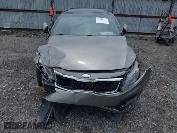 2013 Kia Optima EX z VIN 5XXGN4A78DG196728, wystawiony jako IAAI lot #42242303 z przebiegiem 164 448 mil mil oraz . Historia ofert i sprzedaży dostępna na DreamBid. Obrazek 6.
