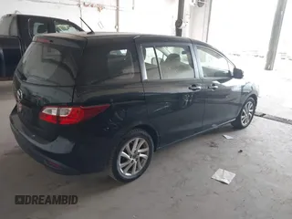 2013 Mazda 5 Sport z VIN JM1CW2BL6D0154104, wystawiony jako IAAI lot #42252435 z przebiegiem 133 413 mil mil oraz . Historia ofert i sprzedaży dostępna na DreamBid. Obrazek 4.