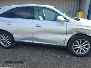 2015 Lexus RX 450h with VIN 2T2ZB1BA4FC002602, listed as a IAAI auction lot 41812562 with 166,220 mi miles and . Bid and sale history available at DreamBid. Image 6.