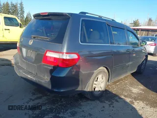 2005 Honda Odyssey EX-L with VIN 5FNRL38685B423426, listed as a IAAI auction lot 41519779 with 423,419 mi miles. Bid and sale history available at carsss.com. Image 4.