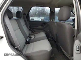 2004 Ford Escape XLS with VIN 1FMYU02144DA18217, listed as a Copart auction lot 43136895 with 135,424 mi miles and Salvage Title. Bid and sale history available at DreamBid. Image 11.