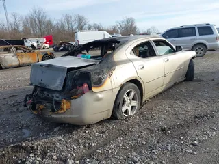 2009 Dodge Charger SXT with VIN 2B3KA33V59H560427, listed as a IAAI auction lot 41550598 with Not Provided miles and . Bid and sale history available at carsss.com. Image 4.