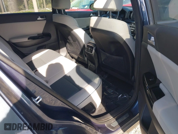 2019 Kia Sportage EX with VIN KNDPNCAC7K7615908, listed as a IAAI auction lot 42004220 with 86,654 mi miles. Bid and sale history available at carsss.com. Image 8.