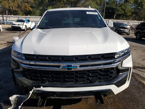 2021 Chevrolet Tahoe Commercial z VIN 1GNSCLED7MR458897, wystawiony jako Copart lot #84170464 z przebiegiem 23 125 mil mil oraz Szkoda całkowita • Salvage title. Historia ofert i sprzedaży dostępna na DreamBid. Obrazek 5.