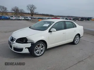 2008 Volkswagen Jetta Sedan S with VIN 3VWJZ71K58M075639, listed as a IAAI auction lot 41855222 with 142,902 mi miles. Bid and sale history available at carsss.com. Image 2.