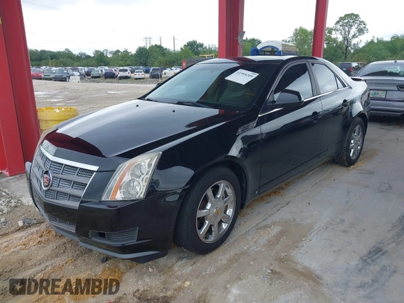 2009 Cadillac CTS RWD w/1SB with VIN 1G6DU57V290147277, listed as a IAAI auction lot 41995209 with 120,576 mi miles. Bid and sale history available at carsss.com. Image 2.