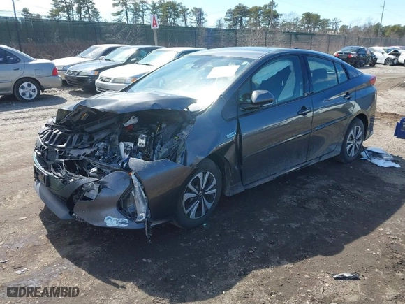 2018 Toyota Prius Prime Plus with VIN JTDKARFP3J3096141, listed as a IAAI auction lot 41822905 with 61,159 mi miles. Bid and sale history available at carsss.com. Image 2.