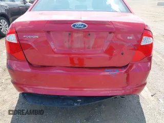 2010 Ford Fusion SE z VIN 3FAHP0HA1AR415945, wystawiony jako IAAI lot #42651204 z przebiegiem 127 765 mil mil oraz . Historia ofert i sprzedaży dostępna na DreamBid. Obrazek 6.