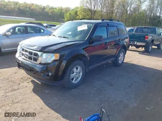 2011 Ford Escape XLT with VIN 1FMCU9DG3BKB52175, listed as a IAAI auction lot 41961760 with 68,057 mi miles. Bid and sale history available at carsss.com. Image 2.