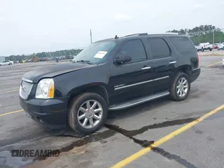 2013 GMC Yukon Denali with VIN 1GKS2EEF7DR306177, listed as a IAAI auction lot 42046734 with 263,976 mi miles. Bid and sale history available at carsss.com. Image 2.