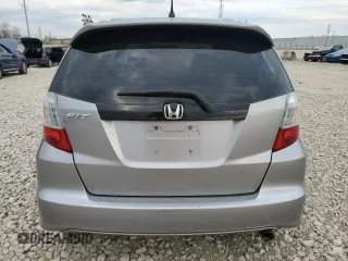 2010 Honda Fit Sport with VIN JHMGE8H40AS023997, listed as a Copart auction lot 53677065 with 105,302 mi miles and Salvage Title. Bid and sale history available at carsss.com. Image 6.