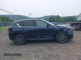 2018 Mazda CX-5 Grand Touring with VIN JM3KFBDMXJ0361812, listed as a IAAI auction lot 42509752 with 131,386 mi miles and . Bid and sale history available at DreamBid. Image 14.