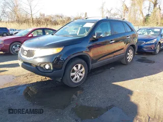 2012 Kia Sorento LX with VIN 5XYKT4A67CG231633, listed as a IAAI auction lot 41210382 with 217,055 mi miles. Bid and sale history available at carsss.com. Image 2.