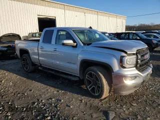 2019 GMC Sierra 1500 Limited SLE with VIN 2GTV2MEC2K1218796, listed as a Copart auction lot 87102594 with 69,667 mi miles and Salvage Title. Bid and sale history available at carsss.com. Image 4.