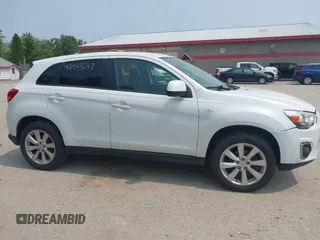 2015 Mitsubishi Outlander ES z VIN 4A4AR3AU8FE057001, wystawiony jako IAAI lot #42433647 z przebiegiem 151 067 mil mil oraz . Historia ofert i sprzedaży dostępna na DreamBid. Obrazek 14.