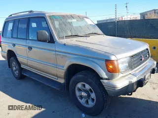 1997 Mitsubishi Montero z VIN JA4MR41R3VJ006477, wystawiony jako IAAI lot #41326277 z przebiegiem 239 378 mil mil oraz . Historia ofert i sprzedaży dostępna na DreamBid. Obrazek 1.