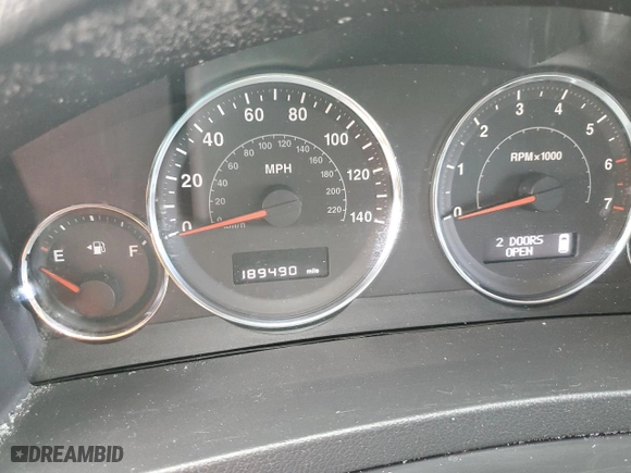 2010 Jeep Grand Cherokee Laredo with VIN 1J4RR4GT0AC123716, listed as a Copart auction lot 86388444 with 189,490 mi miles and Salvage Title. Bid and sale history available at carsss.com. Image 9.