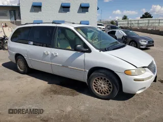 1998 Chrysler Town & Country LXi with VIN 1C4GP64L2WB637437, listed as a Copart auction lot 70504424 with 82,972 mi miles and Salvage Title. Bid and sale history available at carsss.com. Image 4.