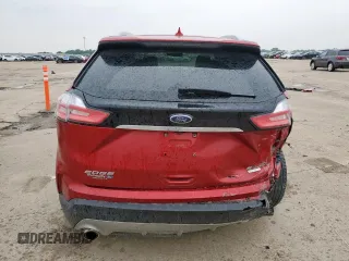 2020 Ford Edge SEL с VIN 2FMPK3J96LBA69376, выставлен на аукционе Copart как лот 57553395 с пробегом 69 468 миль миль и Списание • Salvage title. История ставок и продаж доступна на DreamBid. Изображение 6.