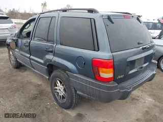 2004 Jeep Grand Cherokee Laredo with VIN 1J4GX48S64C291075, listed as a IAAI auction lot 41805747 with 282,384 mi miles. Bid and sale history available at carsss.com. Image 3.