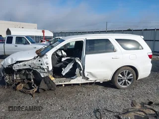 2013 Dodge Durango R/T with VIN 1C4SDHCT4DC648639, listed as a IAAI auction lot 42504044 with 193,909 mi miles and . Bid and sale history available at DreamBid. Image 6.
