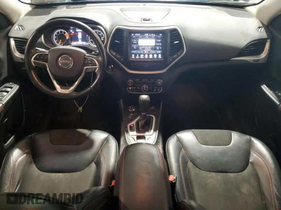 2016 Jeep Cherokee Trailhawk with VIN 1C4PJMBS4GW267375, listed as a Copart auction lot 58476005 with 116,151 mi miles and Salvage title. Bid and sale history available at DreamBid. Image 8.