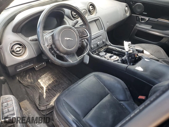 2015 Jaguar XJ with VIN SAJWJ1CD1F8V90815, listed as a Copart auction lot 77977464 with Not provided miles and Salvage title. Bid and sale history available at DreamBid. Image 8.
