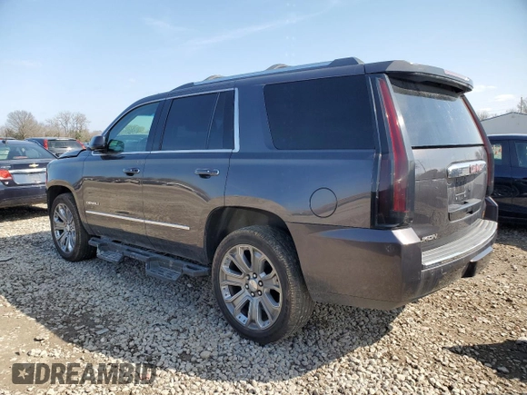 2015 GMC Yukon Denali with VIN 1GKS2CKJXFR539714, listed as a Copart auction lot 51278925 with 129,254 mi miles and Salvage Title. Bid and sale history available at carsss.com. Image 2.