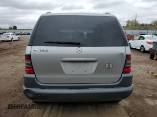 1999 Mercedes-Benz M 320/430/500 with VIN 4JGAB54E7XA078616, listed as a Copart auction lot 55301695 with 137,918 mi miles and Salvage title. Bid and sale history available at DreamBid. Image 6.