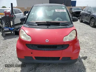 2009 Smart fortwo Pure z VIN WMEEJ31X89K291074, wystawiony jako Copart lot #56897635 z przebiegiem 145 504 mil mil oraz Tytuł czysty. Historia ofert i sprzedaży dostępna na DreamBid. Obrazek 5.