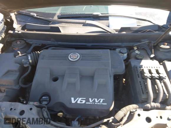 2015 Cadillac SRX with VIN 3GYFNAE35FS608595, listed as a IAAI auction lot 41282751 with 127,055 mi miles and . Bid and sale history available at DreamBid. Image 10.