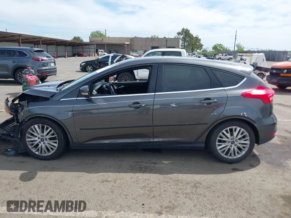 2018 Ford Focus Titanium with VIN 1FADP3N23JL241453, listed as a IAAI auction lot 42025190 with 90,174 mi miles and . Bid and sale history available at DreamBid. Image 14.