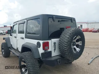 2011 Jeep Wrangler Unlimited Rubicon with VIN 1J4BA6H10BL536027, listed as a IAAI auction lot 42567901 with 164,487 mi miles and . Bid and sale history available at DreamBid. Image 3.