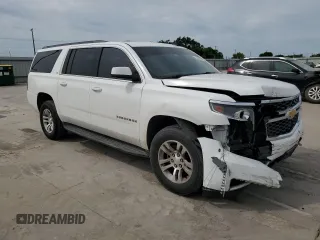 2015 Chevrolet Suburban LT with VIN 1GNSCJKCXFR278235, listed as a Copart auction lot 53805964 with 188,888 mi miles and Salvage Title. Bid and sale history available at DreamBid. Image 4.
