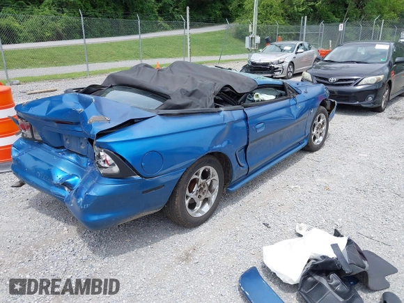 1995 Ford Mustang with VIN 1FALP4449SF205321, listed as a IAAI auction lot 42446725 with 263,272 mi miles and . Bid and sale history available at DreamBid. Image 4.