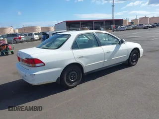 2002 Honda Accord LX with VIN JHMCG56462C018051, listed as a IAAI auction lot 42228727 with 149,269 mi miles and . Bid and sale history available at DreamBid. Image 4.