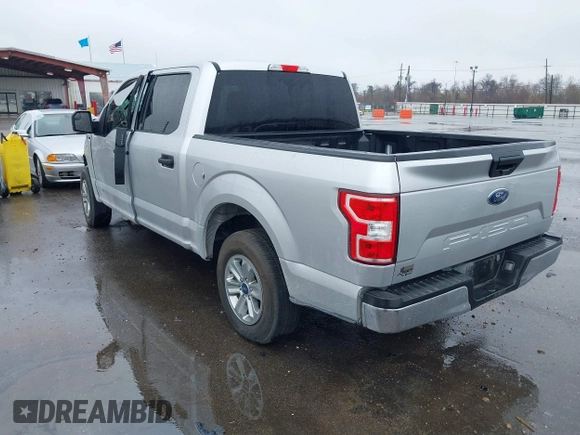 2019 Ford F-150 XL with VIN 1FTEW1CBXKFA20926, listed as a IAAI auction lot 41622704 with 100,440 mi miles and . Bid and sale history available at carsss.com. Image 3.