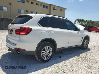 2014 BMW X5 xDrive35i with VIN 5UXKR0C52E0H20513, listed as a Copart auction lot 52831615 with 111,414 mi miles and Salvage Title. Bid and sale history available at carsss.com. Image 3.