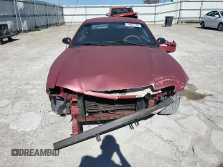 1997 Ford Mustang with VIN 1FALP4043VF109078, listed as a Copart auction lot 74601704 with 133,838 mi miles and Salvage Title. Bid and sale history available at carsss.com. Image 5.
