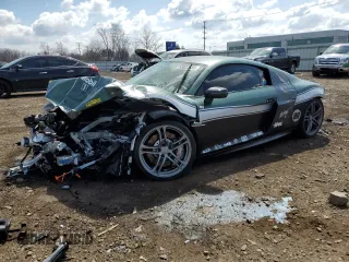 2015 Audi R8 z VIN WUAKNAFG7F7001816, wystawiony jako Copart lot #52622535 z przebiegiem 97 829 mil mil oraz Szkody całkowita. Historia ofert i sprzedaży dostępna na DreamBid. Obrazek 1.