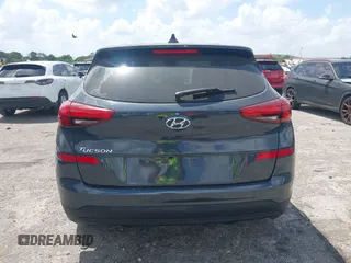 2021 Hyundai Tucson SE with VIN KM8J23A41MU291085, listed as a IAAI auction lot 41956974 with 93,932 mi miles. Bid and sale history available at carsss.com. Image 16.